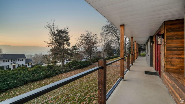 120 N 1400 E, Pleasant Grove, UT 84062 - balcony at dusk featuring covered porch