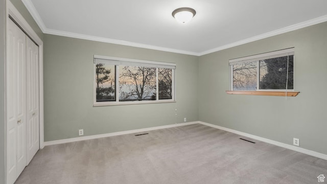 120 N 1400 E, Pleasant Grove, UT 84062 - unfurnished bedroom featuring multiple windows, light colored carpet, a closet, and ornamental molding