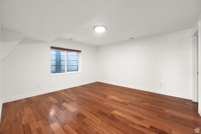 4821 S Fortuna Way, Salt Lake City, UT 84124 - spare room with baseboards and wood finished floors