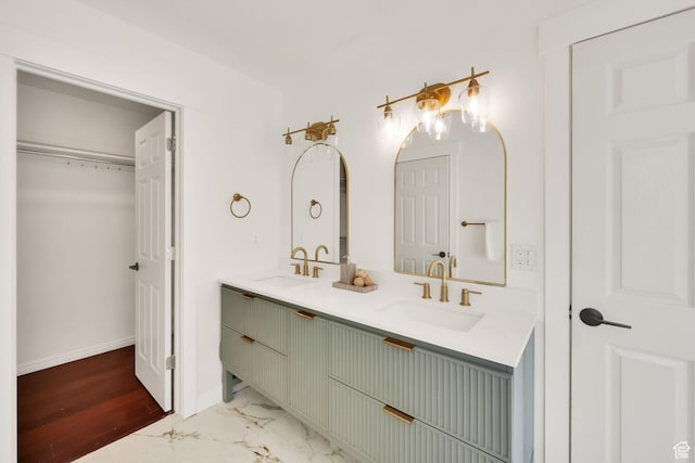 4821 S Fortuna Way, Salt Lake City, UT 84124 - full bath featuring baseboards, double vanity, a sink, and marble finish floor