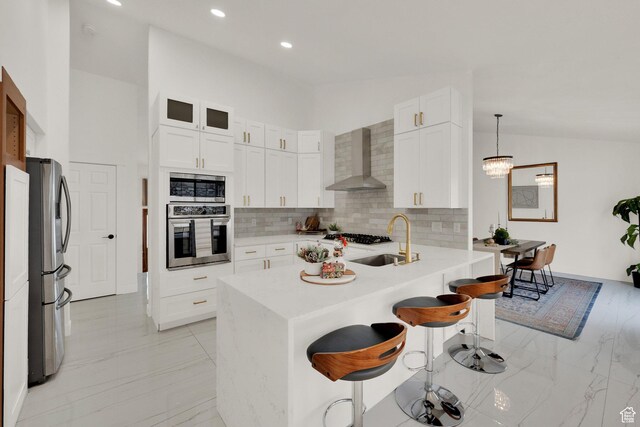4821 S Fortuna Way, Salt Lake City, UT 84124 - kitchen with wall chimney exhaust hood, a sink, stainless steel appliances, and marble finish floor