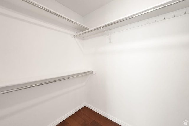 4821 S Fortuna Way, Salt Lake City, UT 84124 - walk in closet featuring dark wood finished floors