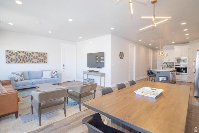 2306 N Park Dr Unit 43, Washington, UT 84780 - dining area with sink and light hardwood / wood-style flooring