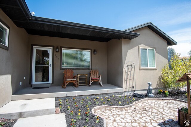 159 S 400 E, Annabella, UT 84711 - view of exterior entry with stucco siding and a patio area