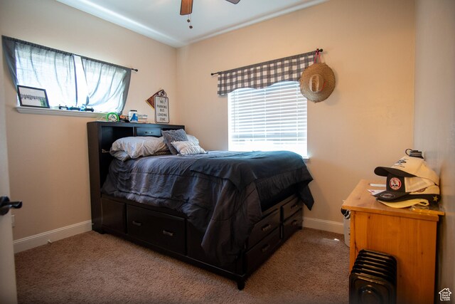159 S 400 E, Annabella, UT 84711 - bedroom with baseboards, carpet, radiator heating unit, and ceiling fan