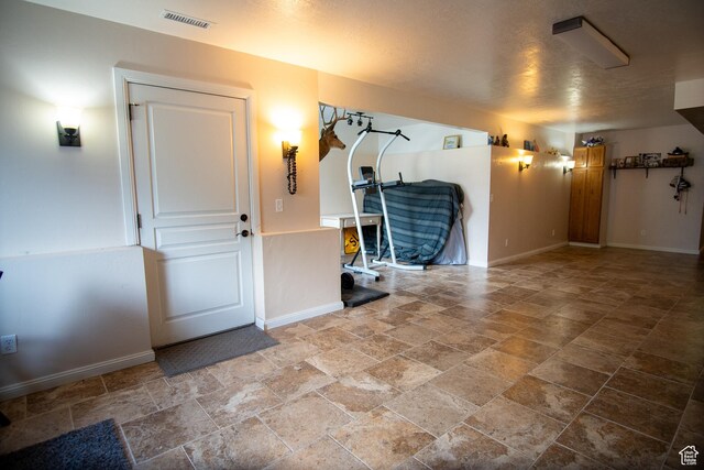 159 S 400 E, Annabella, UT 84711 - interior space featuring stone tile flooring and baseboards