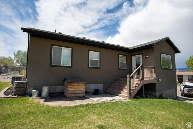 159 S 400 E, Annabella, UT 84711 - rear view of property with a yard and central AC unit