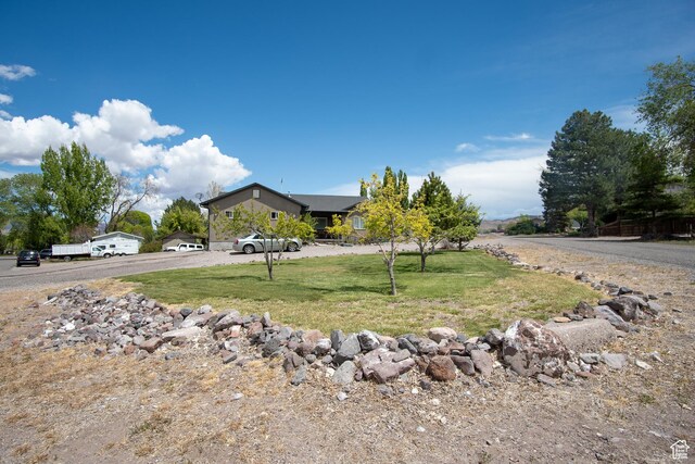 159 S 400 E, Annabella, UT 84711 - view of front facade with a front lawn