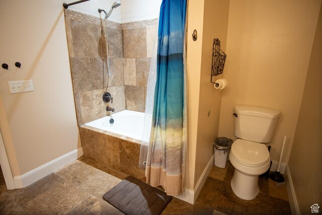 159 S 400 E, Annabella, UT 84711 - bathroom with tiled shower / bath combo, baseboards, toilet, and tile patterned flooring
