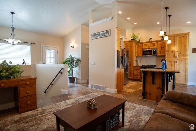 159 S 400 E, Annabella, UT 84711 - living area featuring vaulted ceiling, baseboards, and recessed lighting