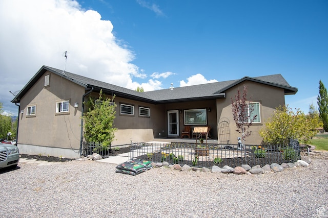 159 S 400 E, Annabella, UT 84711 - ranch-style house with stucco siding and a patio area