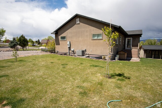 159 S 400 E, Annabella, UT 84711 - rear view of property with a lawn, central AC, and stucco siding