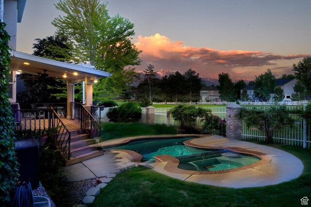 4487 W Tee Box Dr, South Jordan, UT 84009 - view of pool featuring ceiling fan and a pool with connected hot tub