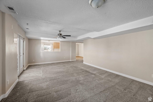 4487 W Tee Box Dr, South Jordan, UT 84009 - empty room featuring a textured ceiling, carpet floors, baseboards, and a ceiling fan