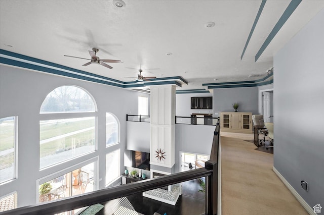 4487 W Tee Box Dr, South Jordan, UT 84009 - corridor with baseboards, light carpet, and an upstairs landing