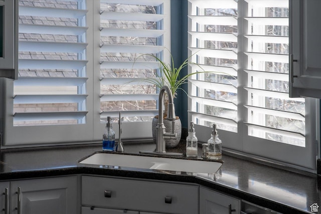 4487 W Tee Box Dr, South Jordan, UT 84009 - kitchen view of a sink and dark countertops