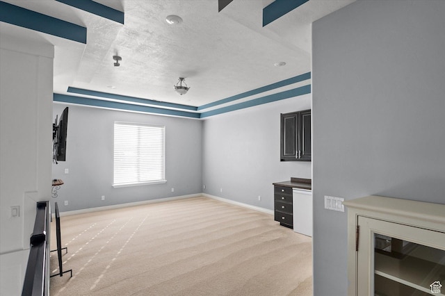 4487 W Tee Box Dr, South Jordan, UT 84009 - unfurnished living room with light carpet, a textured ceiling, baseboards, and beverage cooler
