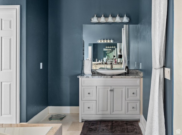4487 W Tee Box Dr, South Jordan, UT 84009 - bathroom featuring vanity and baseboards