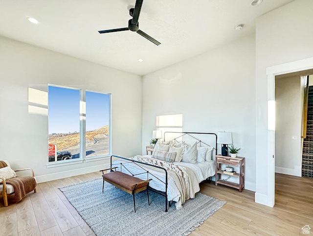 bedroom featuring ceiling fan and light wood-type flooring