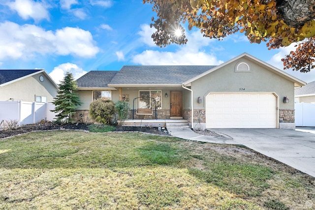 ranch-style house with driveway, a garage, fence, and a front lawn