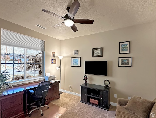 1313 N 250 E, Brigham City, UT 84302 - office space featuring a textured ceiling, a ceiling fan, light carpet, and baseboards