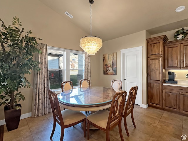 1313 N 250 E, Brigham City, UT 84302 - dining room with vaulted ceiling, light tile patterned flooring, a chandelier, and baseboards