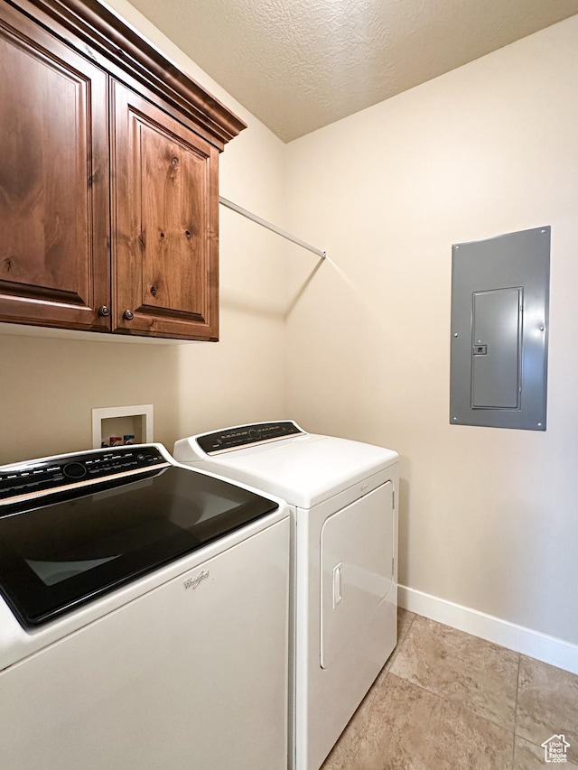 1313 N 250 E, Brigham City, UT 84302 - laundry room with electric panel, cabinet space, baseboards, washer and dryer, and a textured ceiling