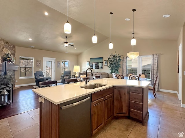 1313 N 250 E, Brigham City, UT 84302 - kitchen featuring stainless steel dishwasher, a sink, lofted ceiling, open floor plan, and healthy amount of natural light