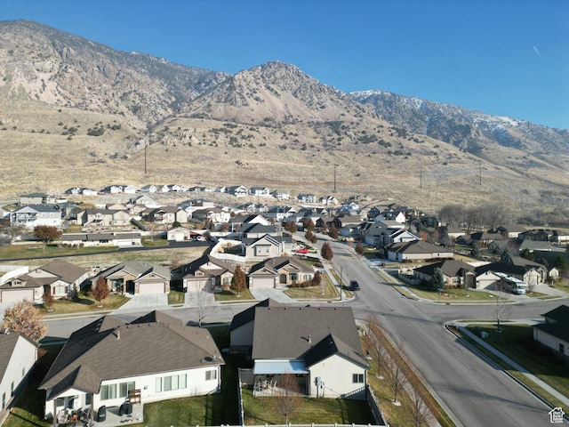 1313 N 250 E, Brigham City, UT 84302 - aerial view of property and surrounding area featuring nearby suburban area and mountains