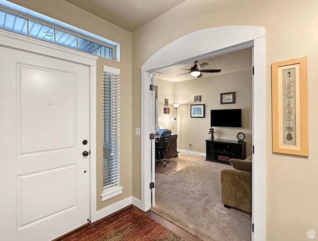1313 N 250 E, Brigham City, UT 84302 - entrance foyer with a ceiling fan, baseboards, and dark colored carpet