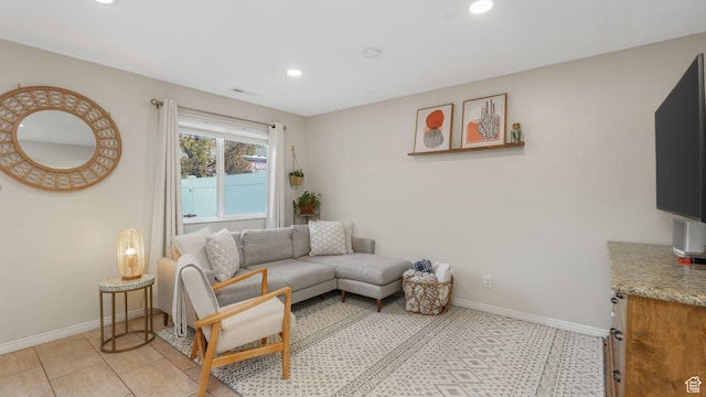 living room with light tile patterned floors