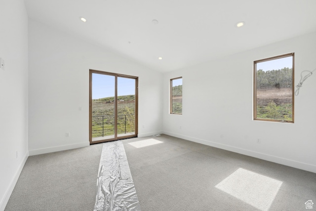 5758 Cobalt Cir Unit 12, Park City, UT 84098 - carpeted spare room featuring healthy amount of natural light, baseboards, lofted ceiling, and recessed lighting