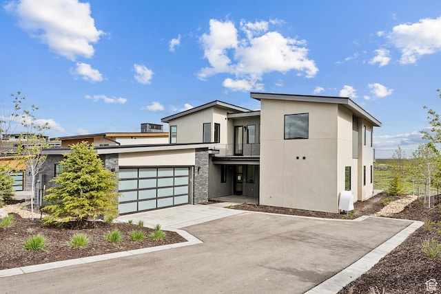 5758 Cobalt Cir Unit 12, Park City, UT 84098 - modern home with stucco siding, a balcony, and a garage