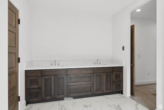 5758 Cobalt Cir Unit 12, Park City, UT 84098 - bathroom with marble look tile flooring, recessed lighting, double vanity, and baseboards