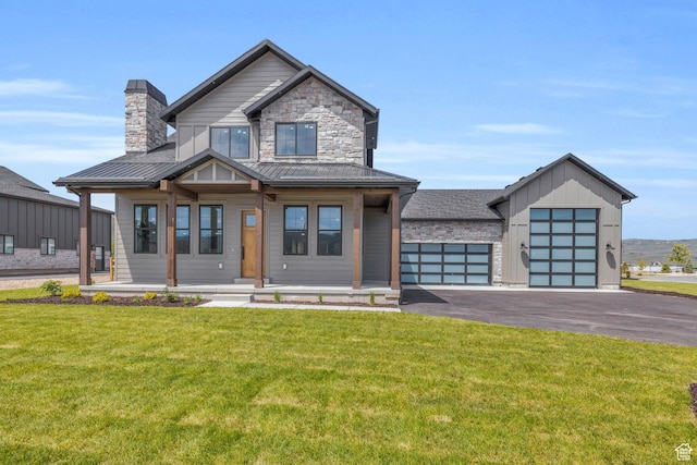 1333 Sage Way Unit 45, Francis, UT 84036 - view of front of property featuring covered porch, a front yard, and a garage