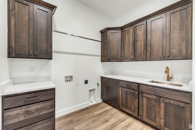 1333 Sage Way Unit 45, Francis, UT 84036 - laundry area featuring cabinets, washer hookup, hookup for an electric dryer, sink, and light hardwood / wood-style flooring