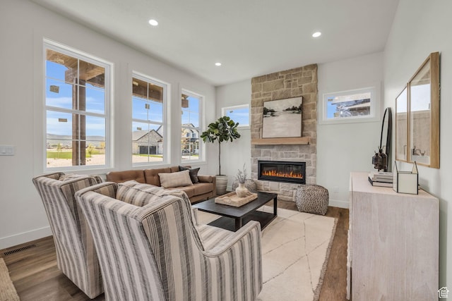 1333 Sage Way Unit 45, Francis, UT 84036 - living room with a stone fireplace and light hardwood / wood-style flooring