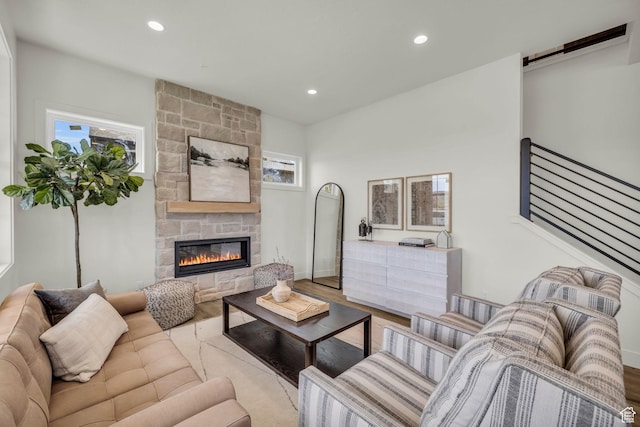 1333 Sage Way Unit 45, Francis, UT 84036 - living room with a fireplace, a healthy amount of sunlight, and light wood-type flooring