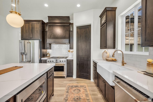 1333 Sage Way Unit 45, Francis, UT 84036 - kitchen with pendant lighting, plenty of natural light, high quality appliances, and sink