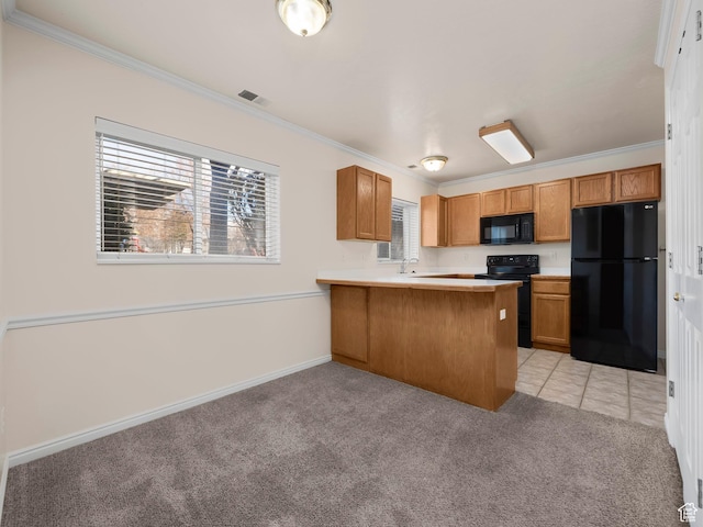 kitchen featuring a peninsula, light colored carpet, black appliances, and crown molding