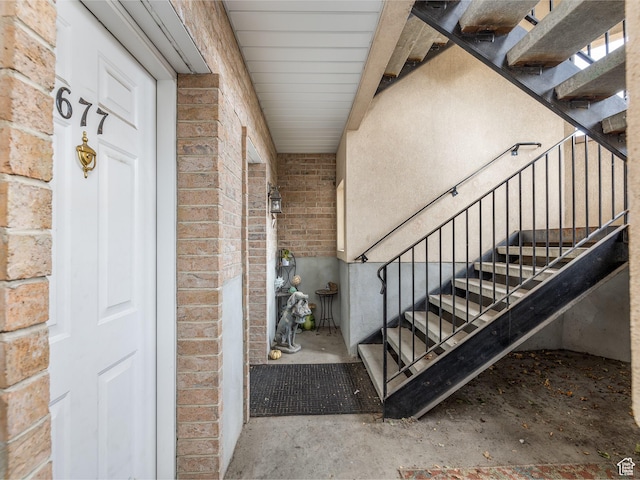 stairway with brick wall