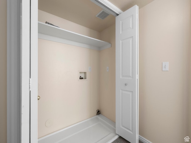 clothes washing area with laundry area, washer hookup, and visible vents