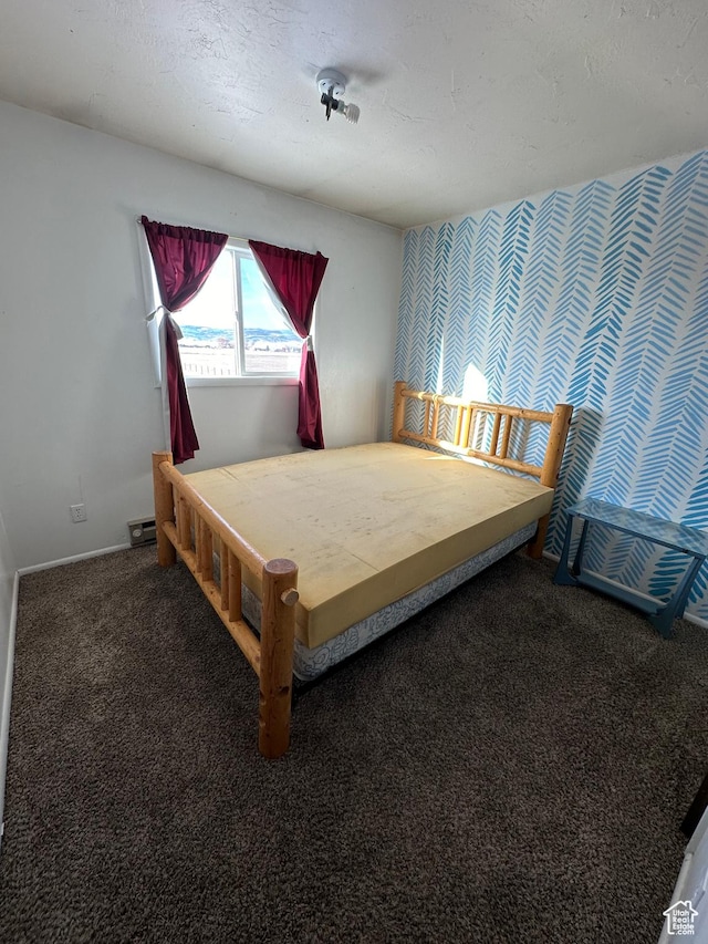 555 N 9th St, Montpelier, ID 83254 - bedroom with carpet floors and baseboards