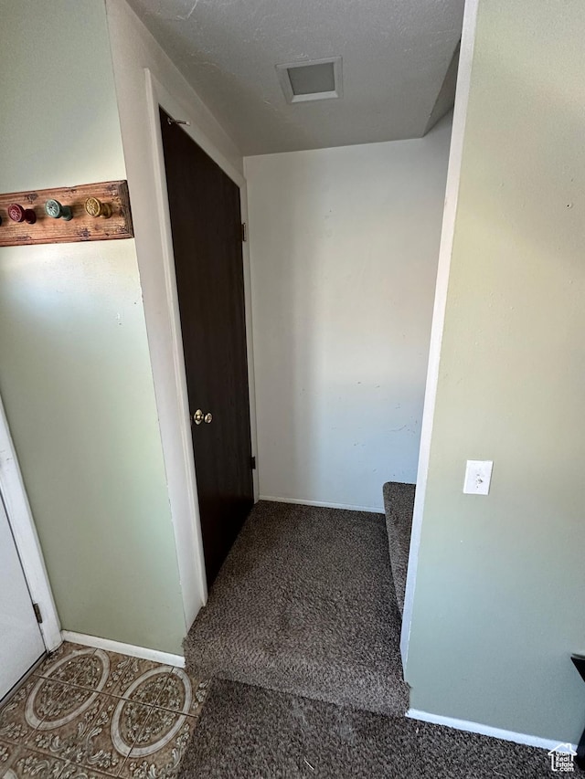 555 N 9th St, Montpelier, ID 83254 - hall featuring carpet flooring