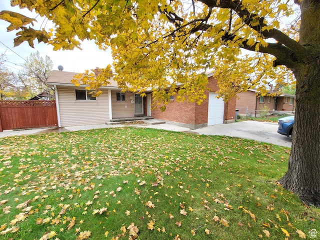636 E 300 N, American Fork, UT 84003 - single story home with brick siding and a garage