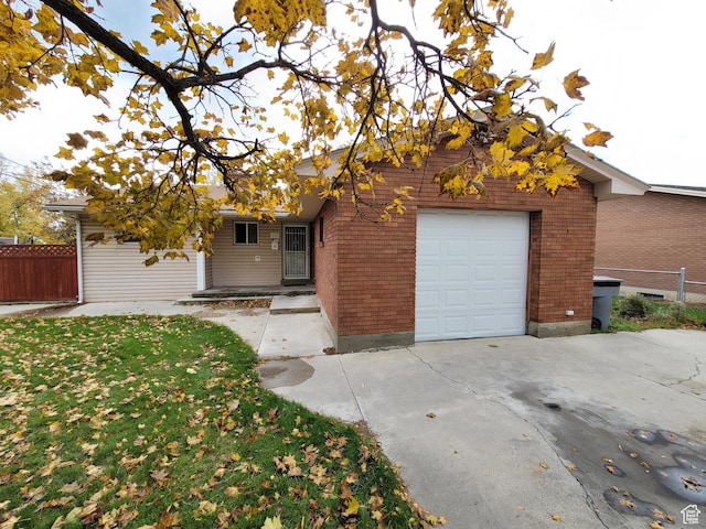 view of front of home with a garage