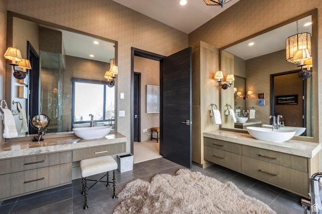 2848 W Deer Pointe Dr, Park City, UT 84060 - bathroom with two vanities, tile patterned flooring, and recessed lighting