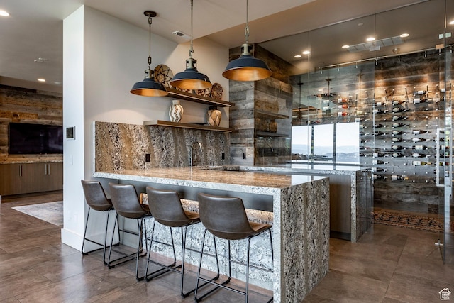 2848 W Deer Pointe Dr, Park City, UT 84060 - bar area featuring decorative light fixtures, recessed lighting, a sink, and dark tile patterned floors