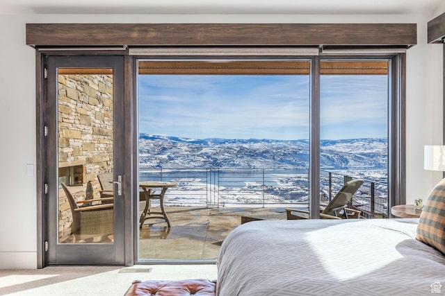 2848 W Deer Pointe Dr, Park City, UT 84060 - bedroom with a mountain view, carpet floors, and access to outside