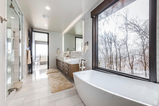 2848 W Deer Pointe Dr, Park City, UT 84060 - full bathroom featuring a freestanding bath, vanity, a stall shower, tile patterned floors, and ensuite bathroom